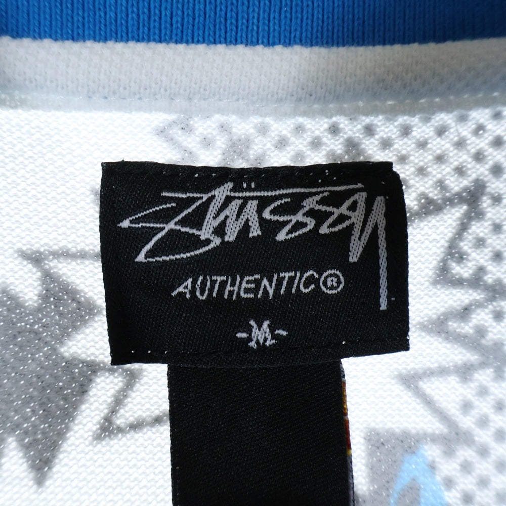 STUSSY(ステューシー) POP SHOUT POLO 総柄 ポロ半袖シャツ ブルー 0141015