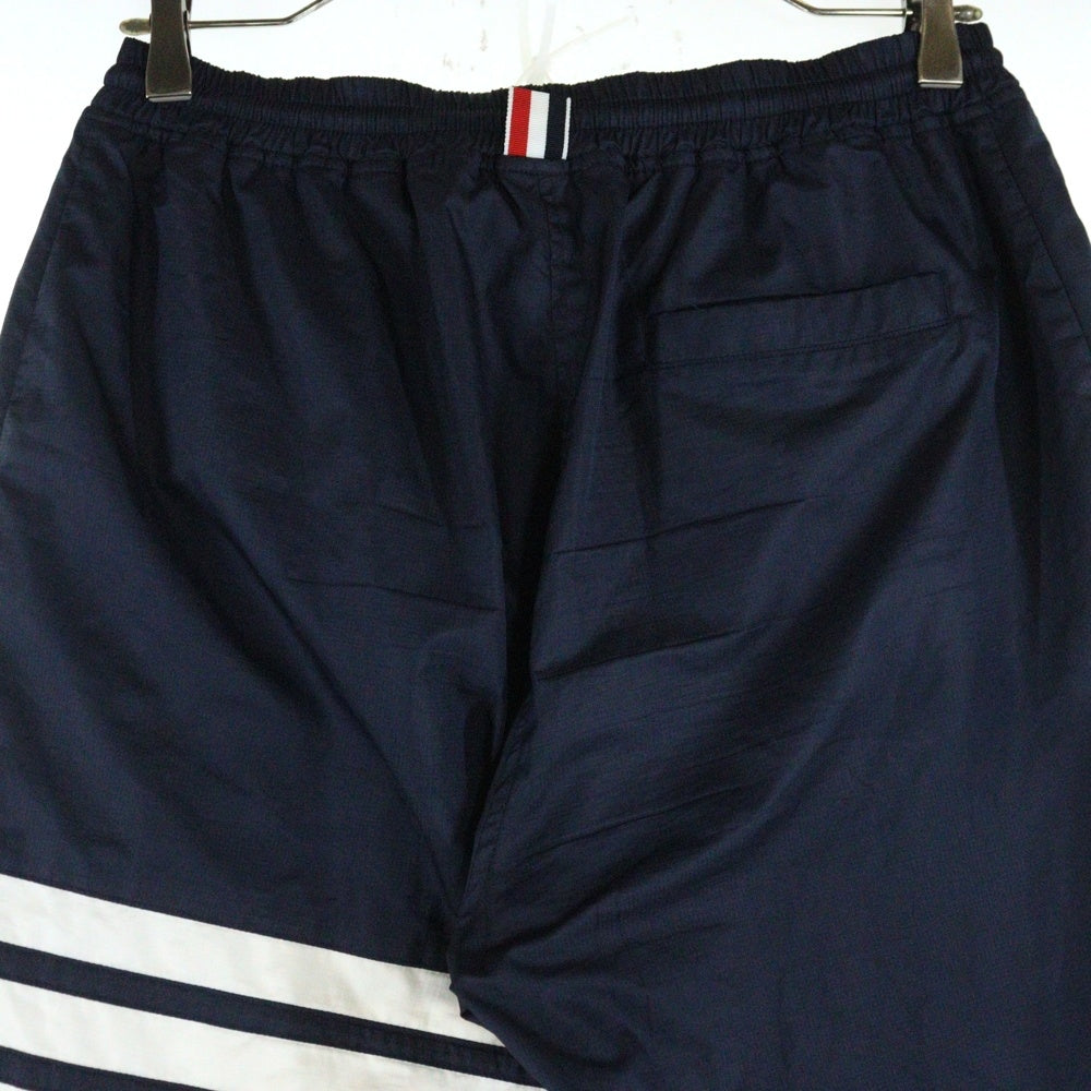 THOM BROWNE(トムブラウン) 4-Bar Striped Sweatpants ナイロン スウェットパンツ ネイビー MJQ024A-02399415