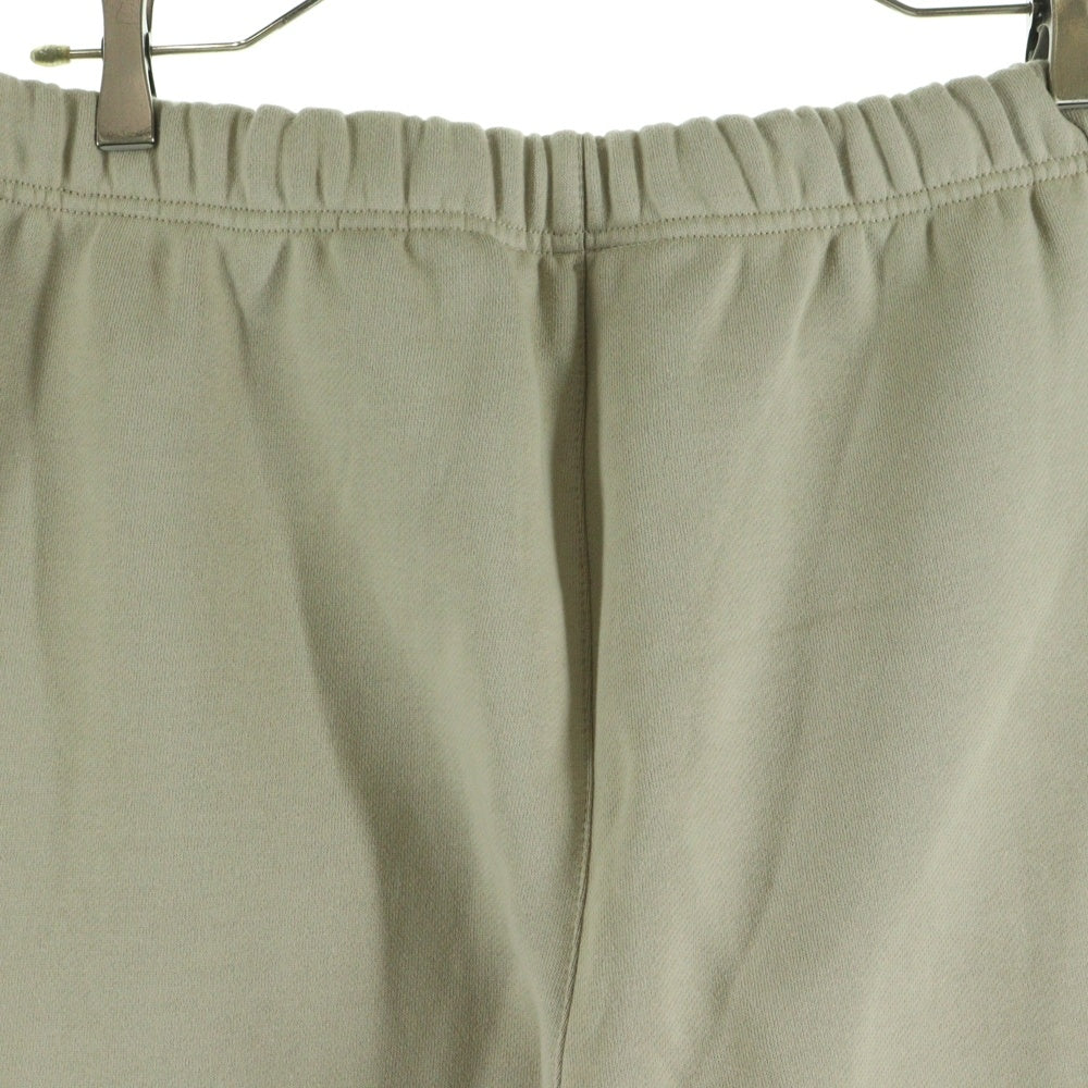 FEAR OF GOD ESSENTIALS(フィアオブゴッド エッセンシャルズ) ラバーロゴ ドローコード フリース スウェットパンツ ベージュ