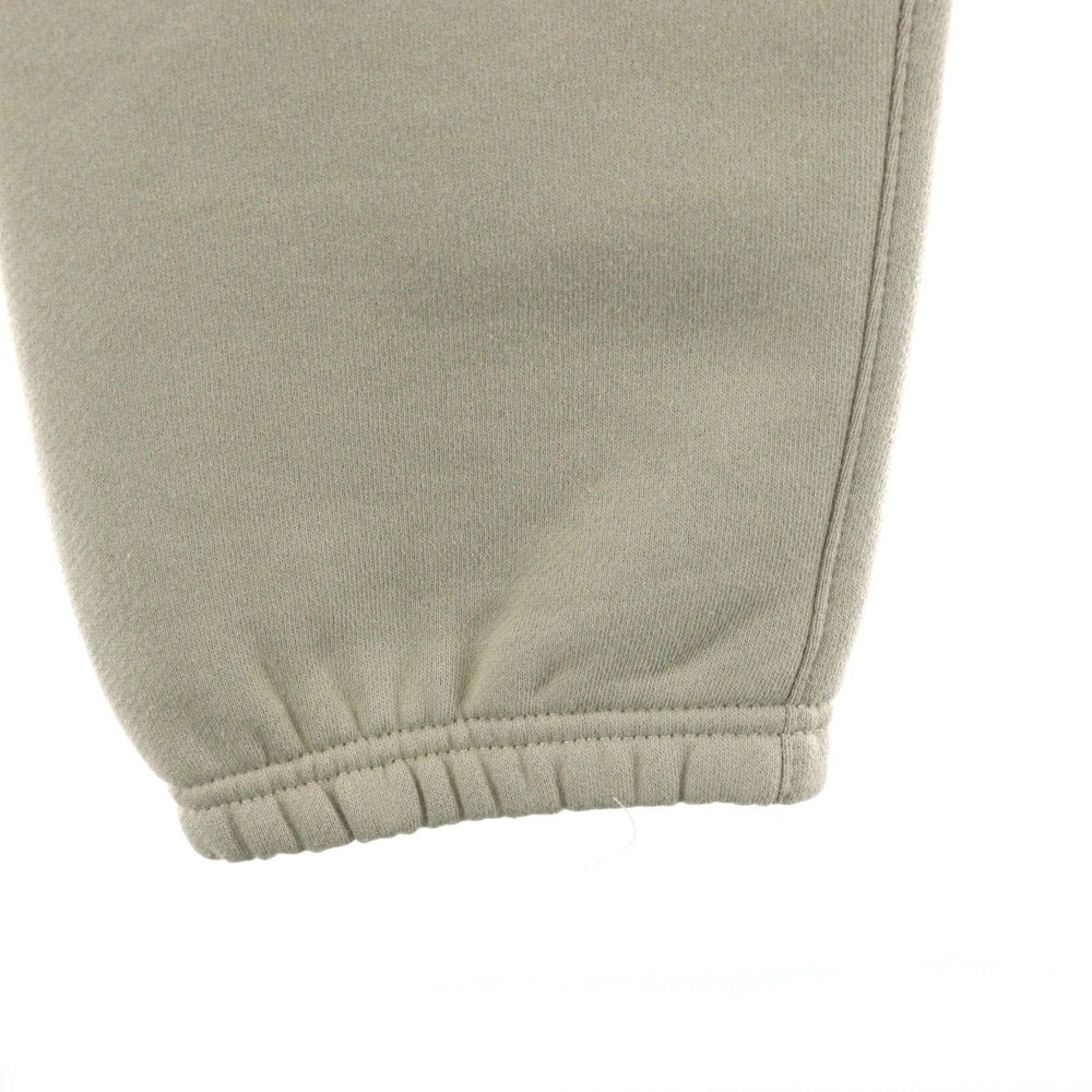 FEAR OF GOD ESSENTIALS(フィアオブゴッド エッセンシャルズ) ラバーロゴ ドローコード フリース スウェットパンツ ベージュ