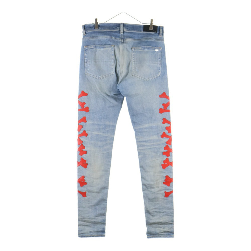 AMIRI(アミリ) MX-1 TOKYO XO BONES JEANS ボーンレザーパッチ スキニーデニムパンツ ジーンズ インディゴ/レッド