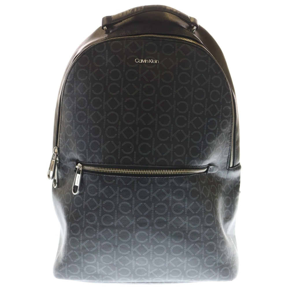 Calvin Klein(カルバンクライン) Minimalism Round Bag Pack ミニマリズムラウンドバッグパック ロゴ総柄リュックサック ブラック