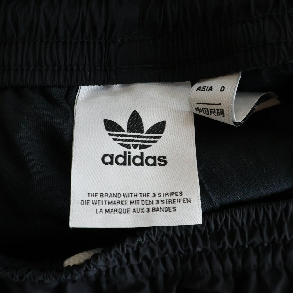 adidas(アディダス) Adilenium Over Size SST Track Pants アディレニウム オーバーサイズSSTトラックパンツ ロゴ刺繍ジップナイロンイージーパンツ JX1692 1L8006 ブラック