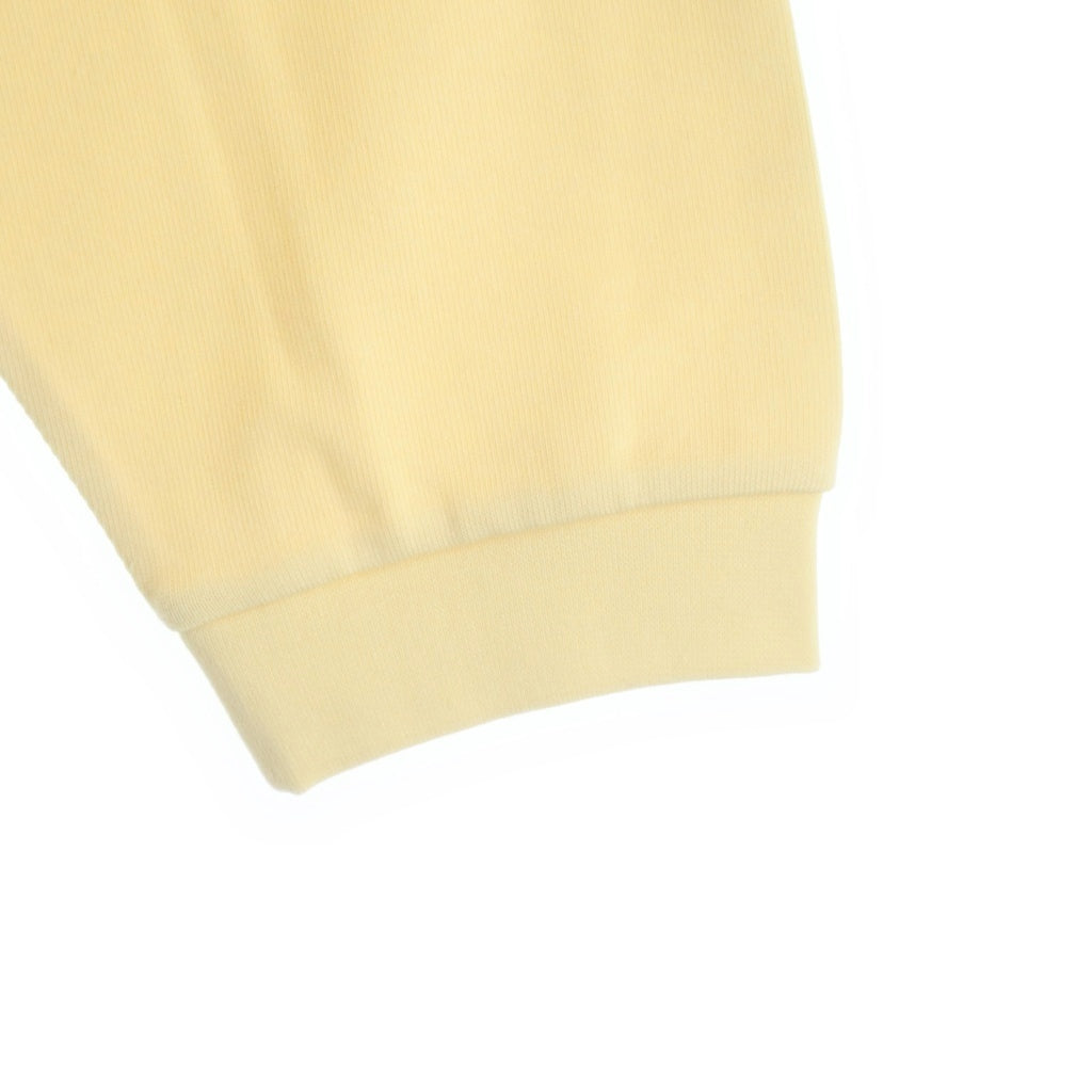 FEAR OF GOD ESSENTIALS(フィアオブゴッド エッセンシャルズ) Mock Neck L/S Tee モックネックロングスリーブTシャツ ラバーロゴ長袖Tシャツ イエロー