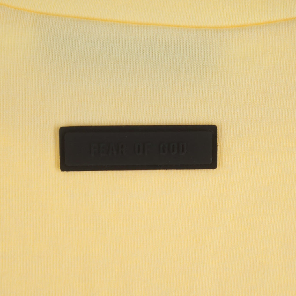 FEAR OF GOD ESSENTIALS(フィアオブゴッド エッセンシャルズ) Mock Neck L/S Tee モックネックロングスリーブTシャツ ラバーロゴ長袖Tシャツ イエロー