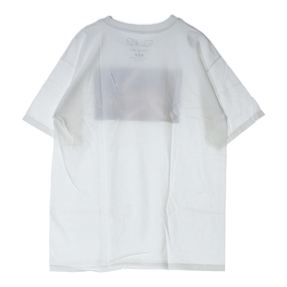 HUF(ハフ) ×DENNIS McGRATH HUF ZINGER デニス・マクグラス ハフジンガー フォトプリント 半袖Tシャツ カットソー ホワイト