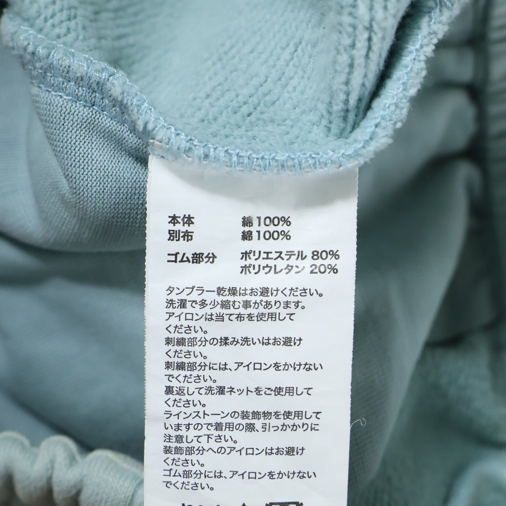 UNKNOWN LONDON(アンノーンロンドン) クロス ラインストーン スウェットパンツ ブルー