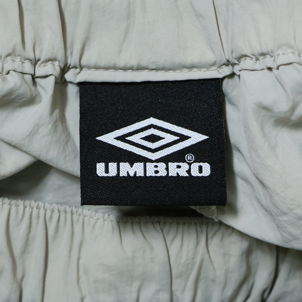 UMBRO(アンブロ) ×HTH フルジップ ナイロン パンツ クリーム