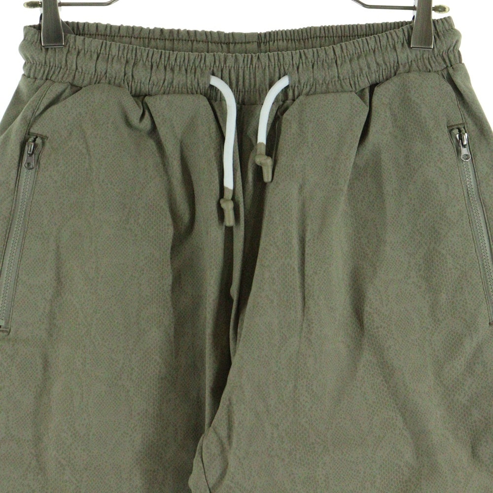 FUCKING AWESOME(ファッキンオーサム) ロゴプリント ナイロン トラックパンツ ベージュ