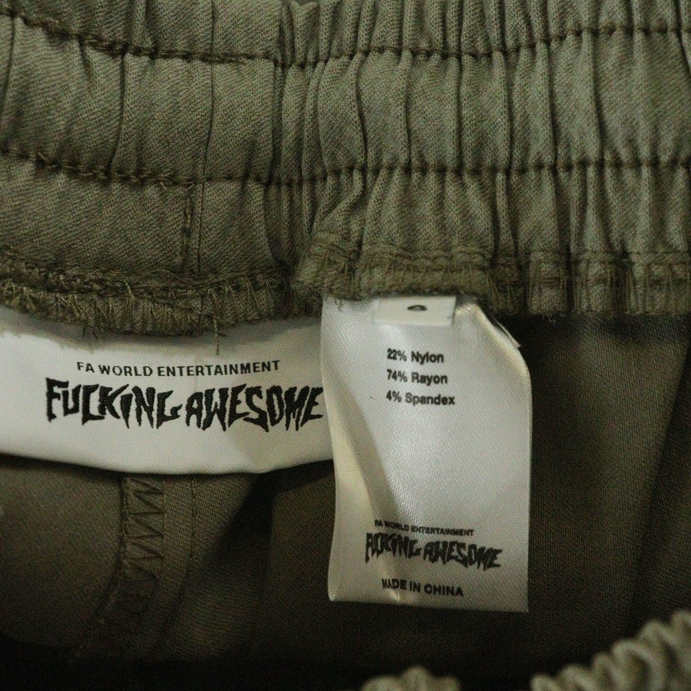 FUCKING AWESOME(ファッキンオーサム) ロゴプリント ナイロン トラックパンツ ベージュ
