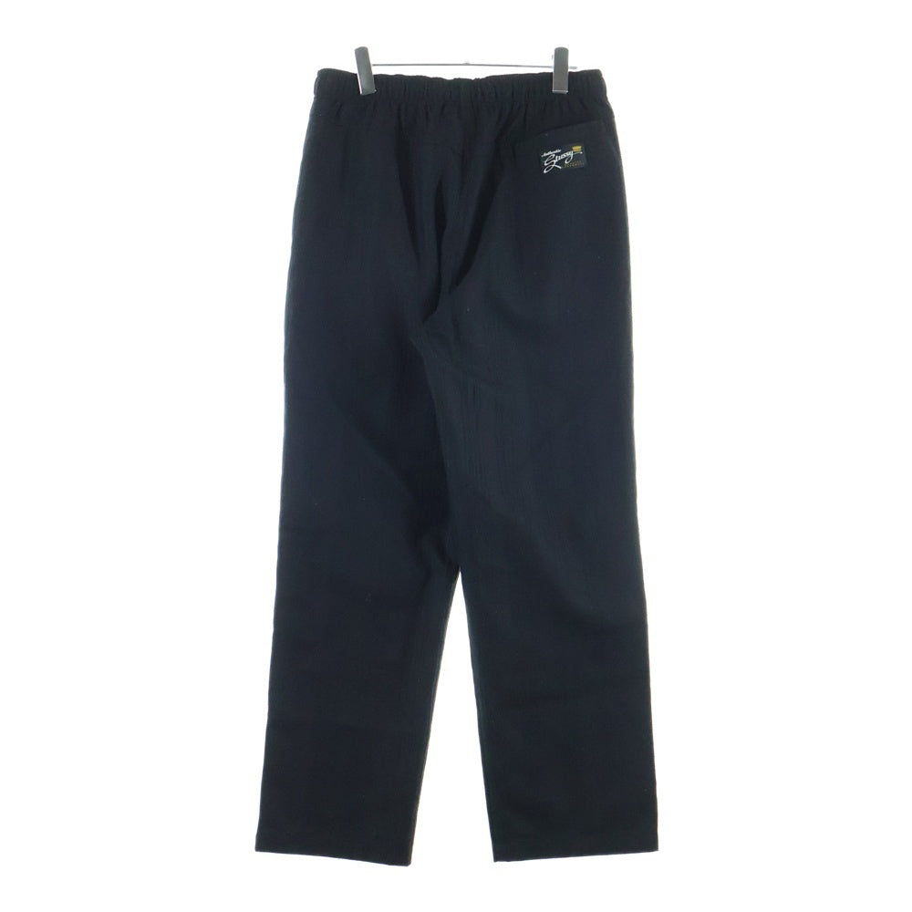 STUSSY(ステューシー) Beach Pant Stitch Stripe ストライプステッチ リラックス ワイドパンツ ブラック 116649