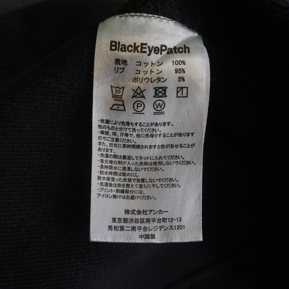 THE BLACK EYE PATCH(ブラックアイパッチ) 取扱注意 センターパッチ バックプリント クルーネック スウェット トレーナー グレー