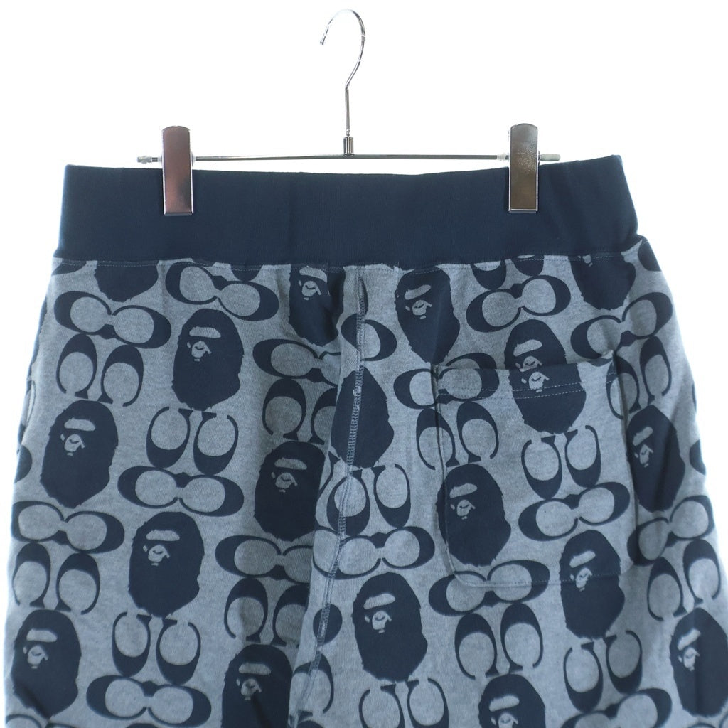 A BATHING APE(アベイシングエイプ) 21SS × COACH Signature Monkey Pants コーチ シグネチャー エイプヘッド 総柄 スウェットハーフパンツ ショーツ グレー/ネイビー 001SPH731902C