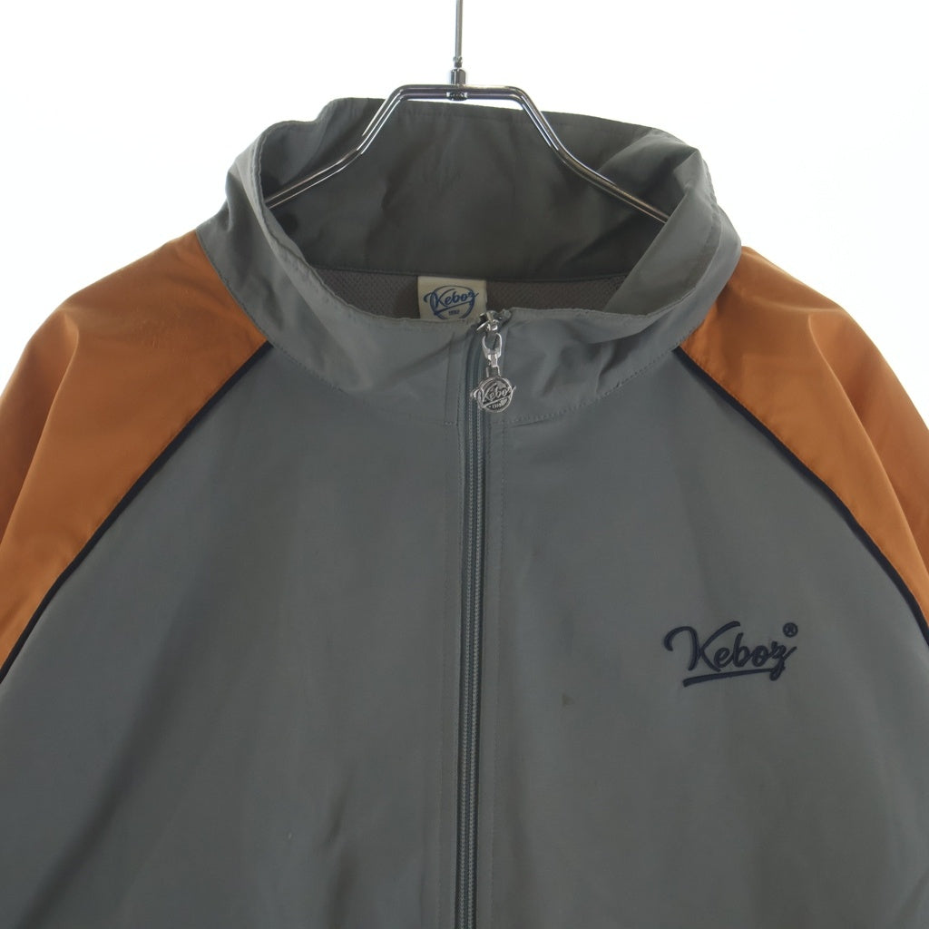 KEBOZ(ケボズ) 2TONE TRACK JACKET ロゴ刺繍 ツートーン ジップアップ ナイロン トラックジャケット グレー/オレンジ