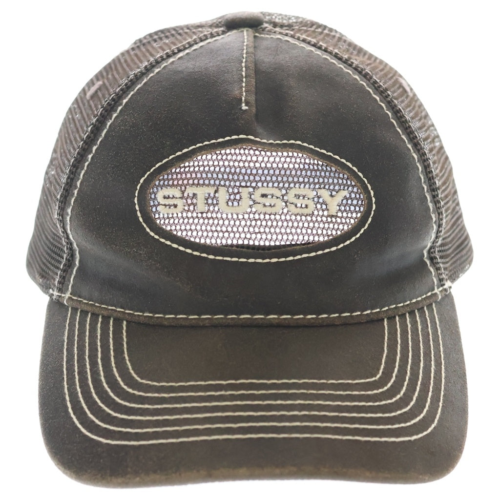 STUSSY(ステューシー) Cut Out Leather Trucker Cap ロゴ刺繍 カットアウト レザー メッシュ トラッカーキャップ ブラウン