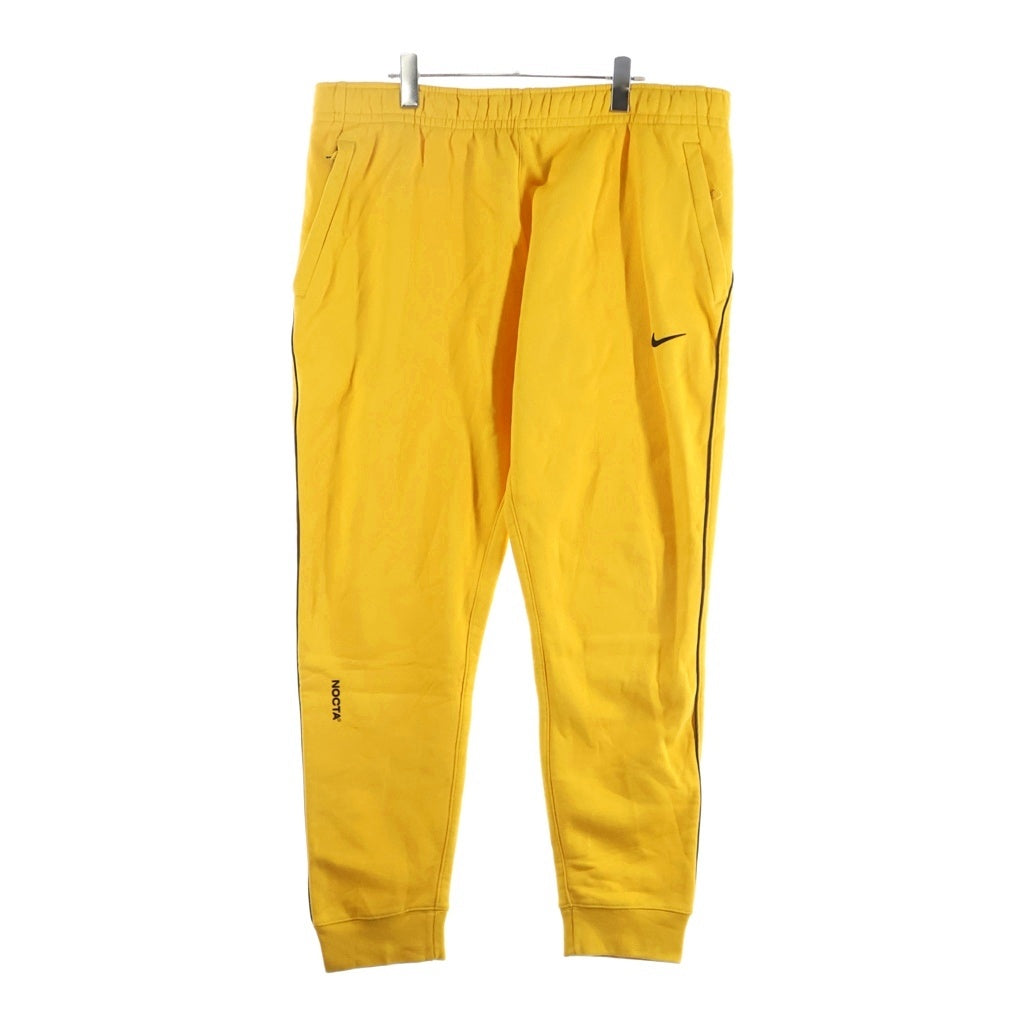 NIKE(ナイキ) 20AW ×DRAKE NOCTA NRG AU FLEECE PANT ドレイクノクタ ラバーロゴ フリース トラックパンツ イエロー DA3935-739