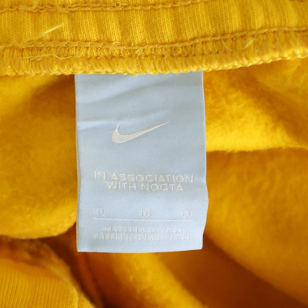 NIKE(ナイキ) 20AW ×DRAKE NOCTA NRG AU FLEECE PANT ドレイクノクタ ラバーロゴ フリース トラックパンツ イエロー DA3935-739