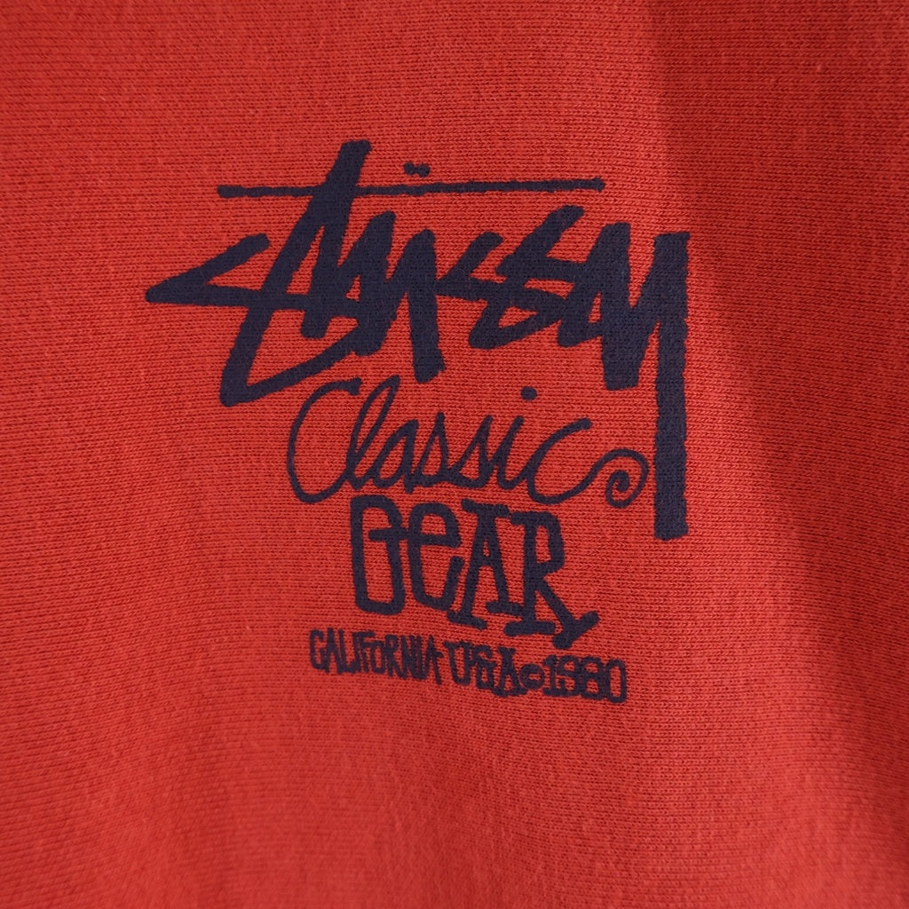 STUSSY(ステューシー) 25SS CLASSIC GEAR HOODIE クラシックギア 両面ロゴプリント プルオーバースウェットパーカー レッド 1925084