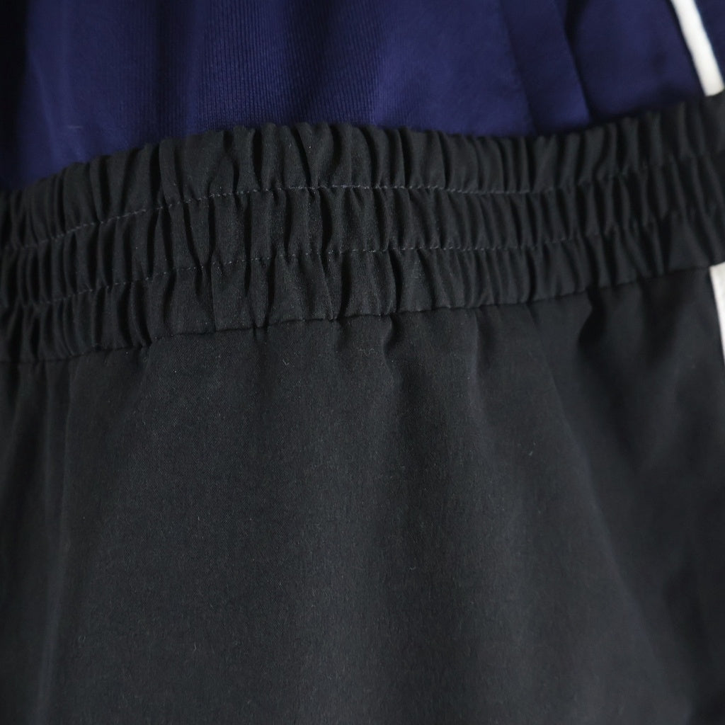 BALENCIAGA(バレンシアガ) 24AW CUT-UP TRACKSUIT PANTS ループスポーツロゴ カットアップ レイヤード トラックスーツ パンツ ブラック/ネイビー 808909 TR031
