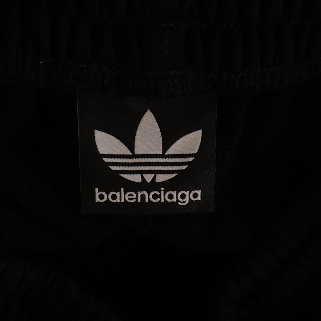 BALENCIAGA(バレンシアガ) ×adidas Baggy Sweatpants アディダス サイドライン ロゴ刺繍 バギースウェットパンツ トラックパンツ ブラック/レッド 723970 TNVN5