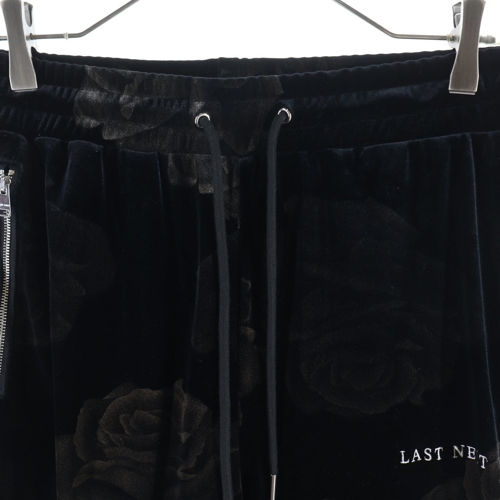 LAST NEST(ラスト ネスト) ローズプリント ベロア トラックパンツ ブラック