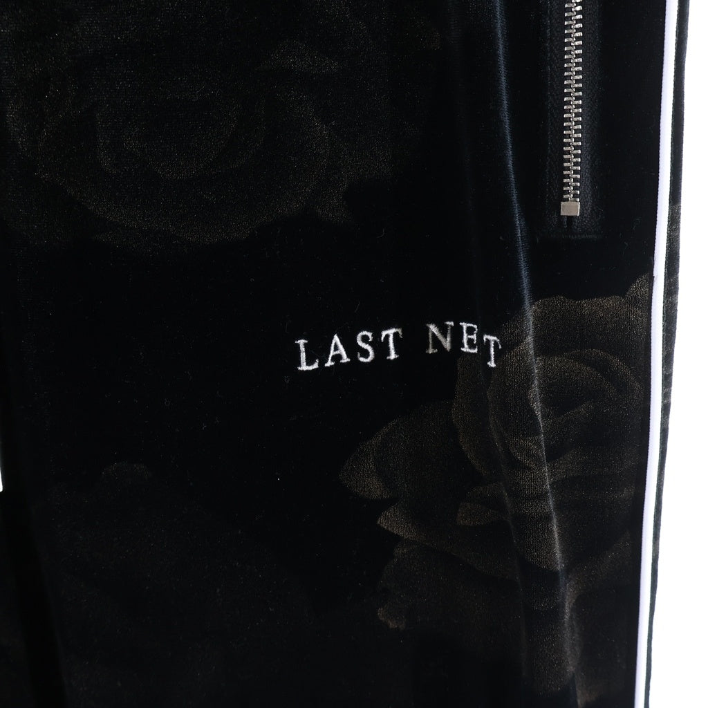 LAST NEST(ラスト ネスト) ローズプリント ベロア トラックパンツ ブラック