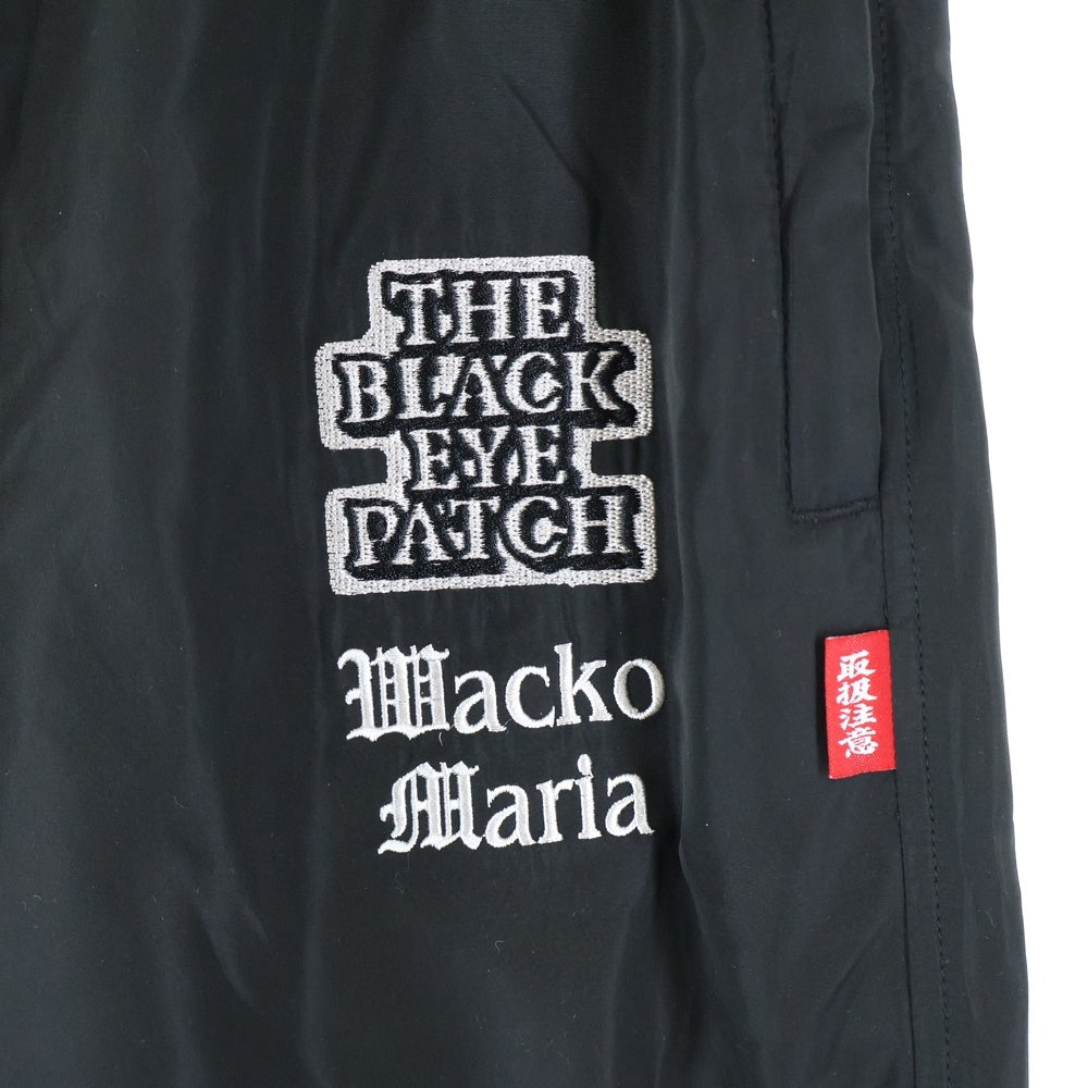 WACKO MARIA(ワコマリア) ×THE BLACK EYE PATCH TRACK PANTS TYRE-1 ブラックアイパッチ ナイロン トラッパンツ ブラック BEP-WM-TP01