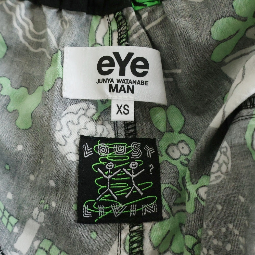 eYe COMME des GARCONS JUNYA WATANABE MAN(アイ コム デ ギャルソン ジュンヤ ワタナベ マン) 綿ブロードプリン LOUSY LIVIN Wネームショーツ ハーフパンツ ブラック/グリーン WM-P918