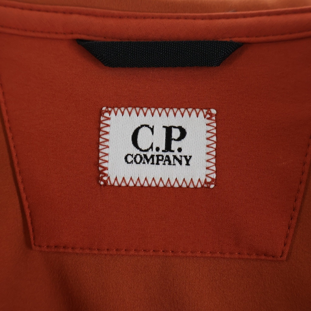 C.P. Company(シーピーカンパニー) C.P. SHELL-R ゴーグル フーデッド ソフトシェルジャケット オレンジ 10CMOW013A 005968A