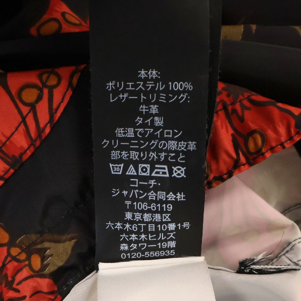 COACH(コーチ) フラワー総柄 ジップアップ フーデッド ナイロン マウンテンパーカー ジャケット ブラック/レッド F26812