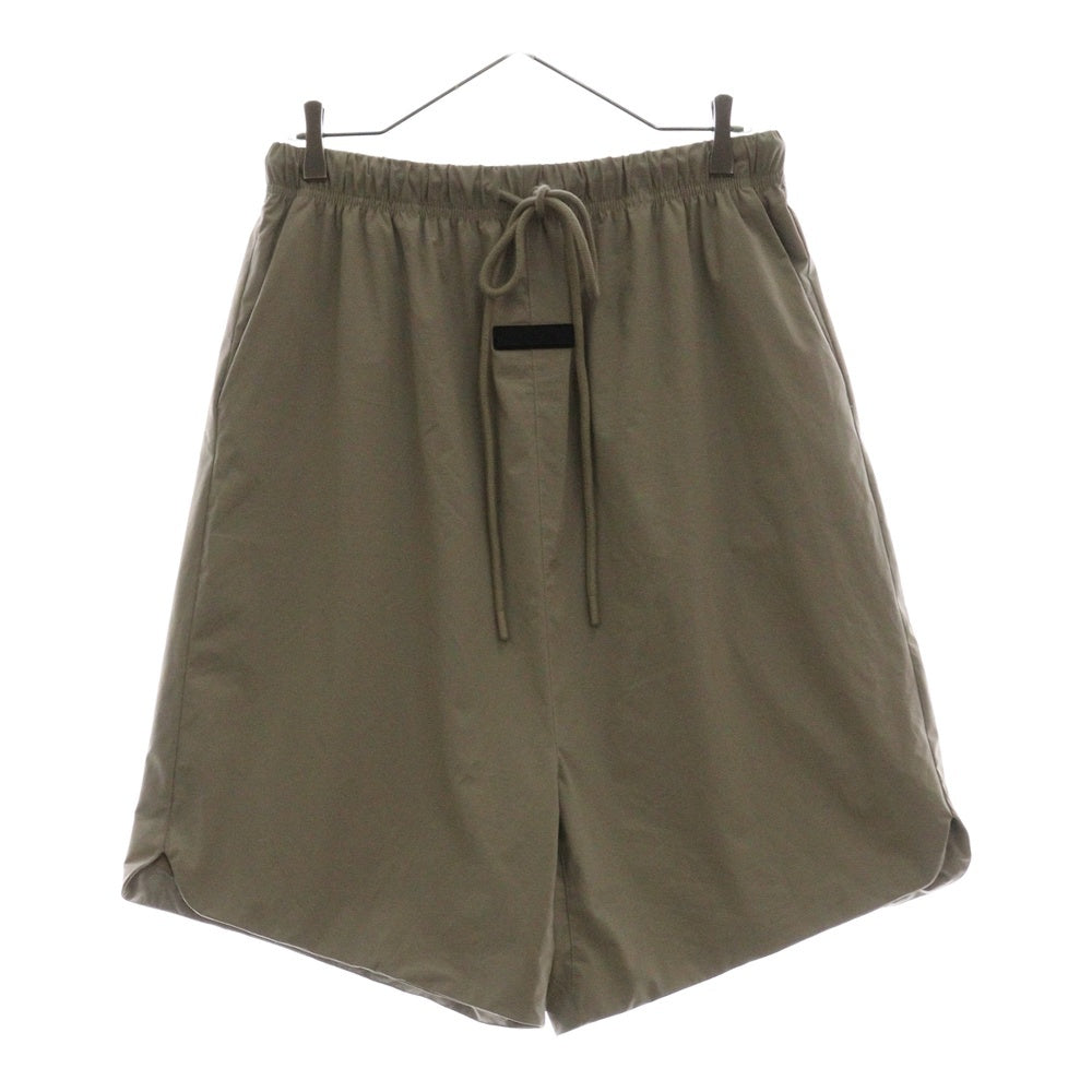 FEAR OF GOD ESSENTIALS(フィアオブゴッド エッセンシャルズ) NYLON SHORT PANTS ラバーロゴ ナイロンハーフパンツ ショーツ ベージュ