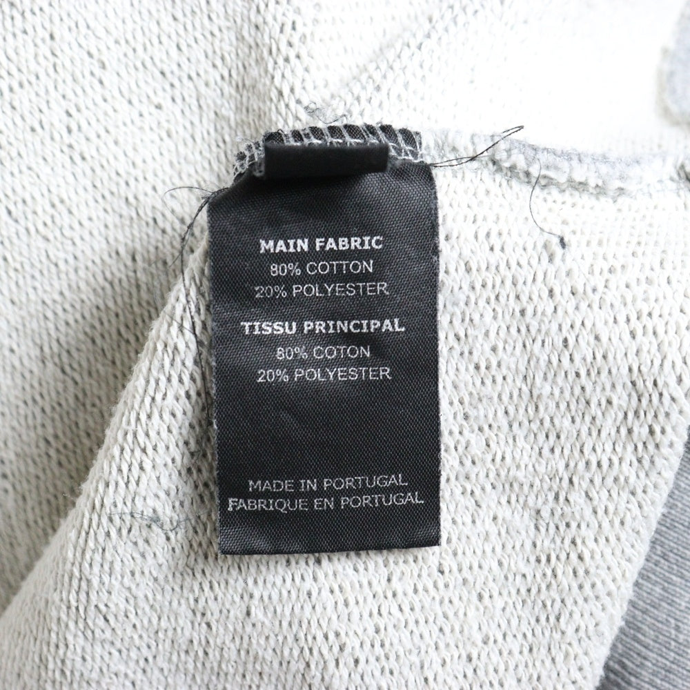 VETEMENTS(ヴェトモン) オーバーサイズ ロゴラベル付き プルオーバーパーカー グレー UE51TR550G