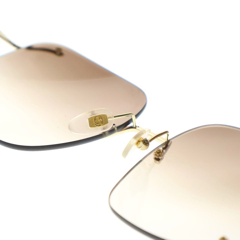 GUCCI(グッチ) スクエアサングラス Gロゴ GG0646S 002 ゴールド レディース