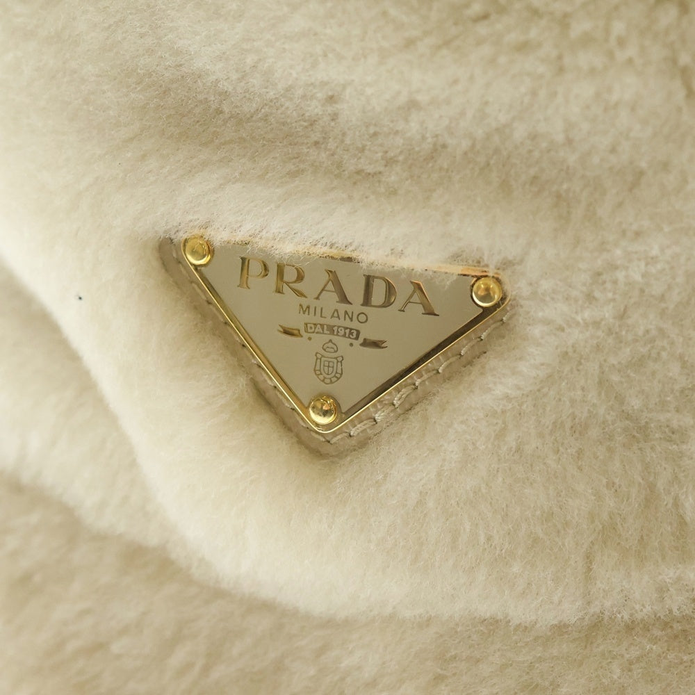 PRADA(プラダ) シアリング バケットハット 1HC137 2EC9 ベージュ レディース