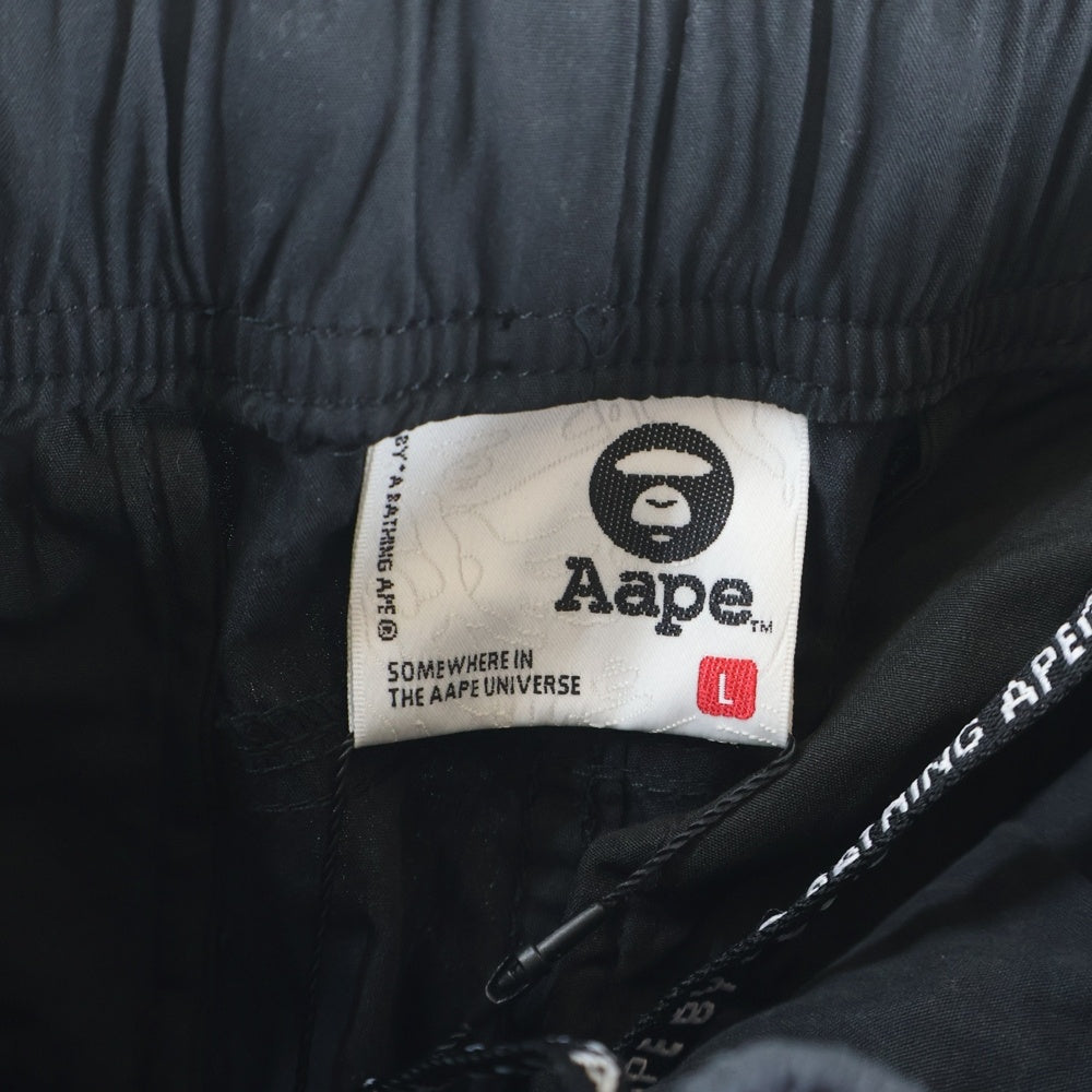 AAPE BY A BATHING APE(エーエイプバイアベイシングエイプ) フロントワッペン付きカーゴパンツ AAPPTMB633XXN ブラック