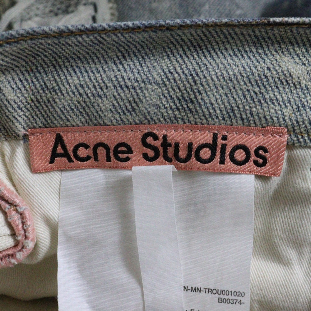 Acne Studios(アクネ ストゥディオズ) トロンプルイユ チェーングラフィック ボタンフライ バギー デニムパンツ インディゴ FN-MN-TROU001020