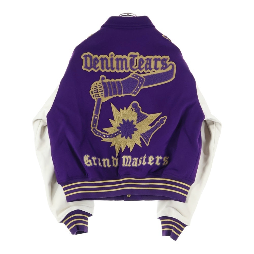DENIM TEARS(デニムティアーズ) Grandmaster Varsity Jacket グランドマスター バーシティ ジャケット SS25OCB002 パープル