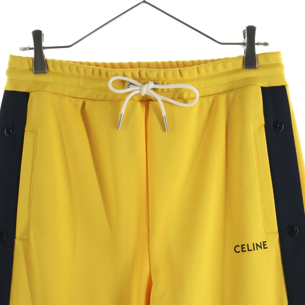 CELINE(セリーヌ) フロントロゴ刺繍 サイドスナップボタン トラックパンツ イエロー 2Z223121O