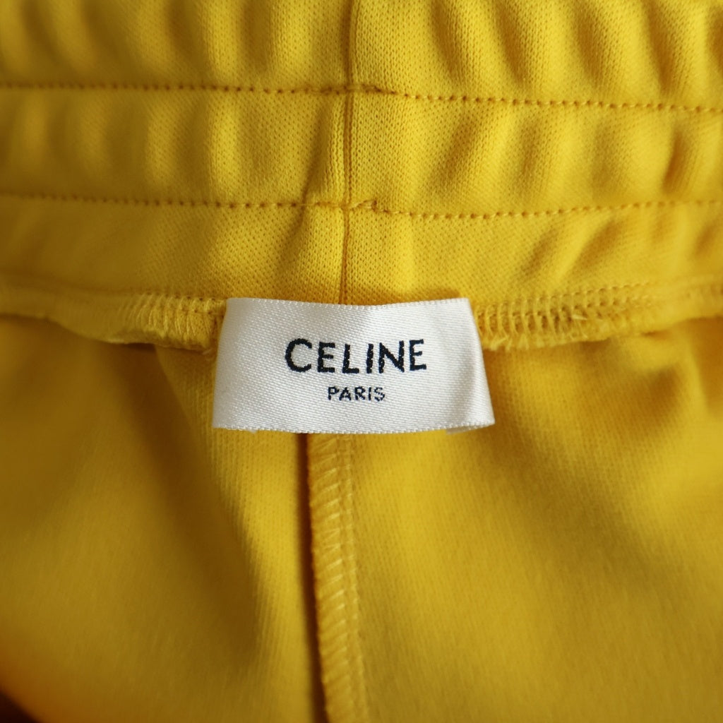 CELINE(セリーヌ) フロントロゴ刺繍 サイドスナップボタン トラックパンツ イエロー 2Z223121O
