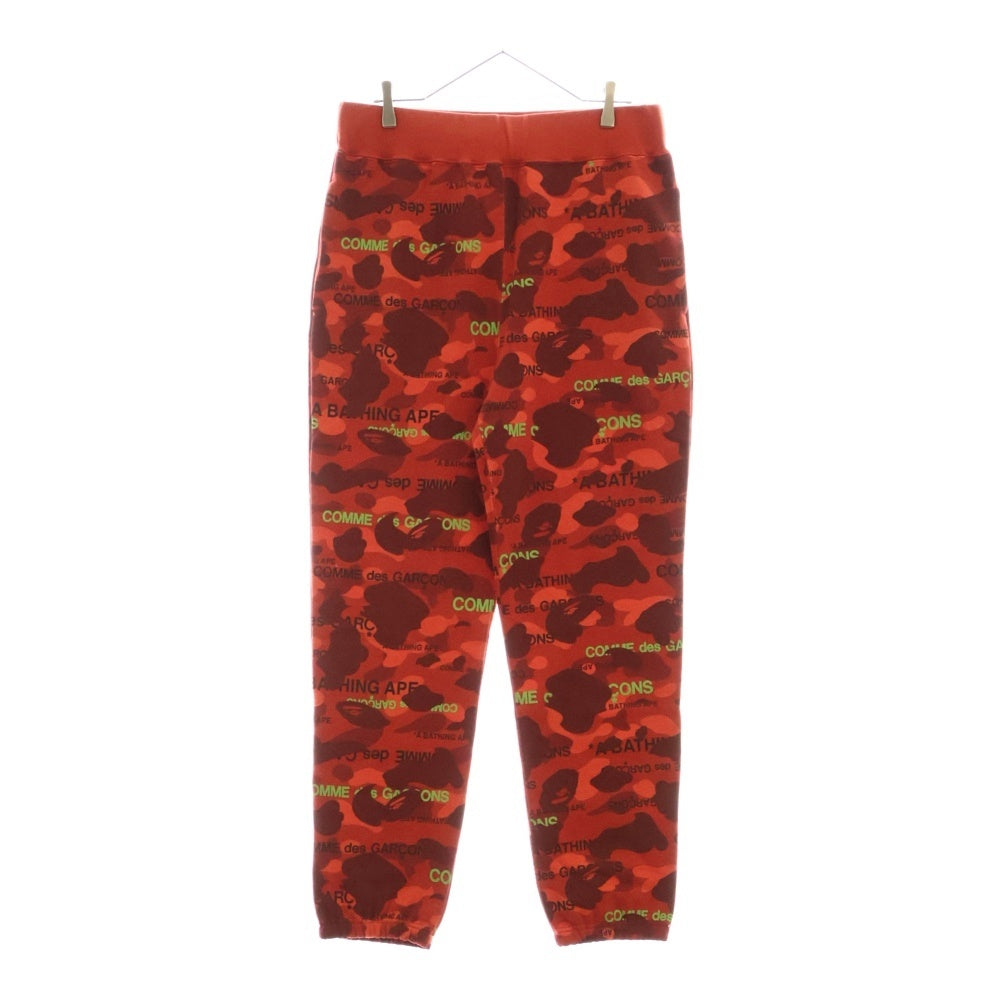 A BATHING APE(アベイシングエイプ) 22AW ×COMME des GARCONS コムデギャルソン カモ総柄 スウェットパンツ レッド 001PTI731901C