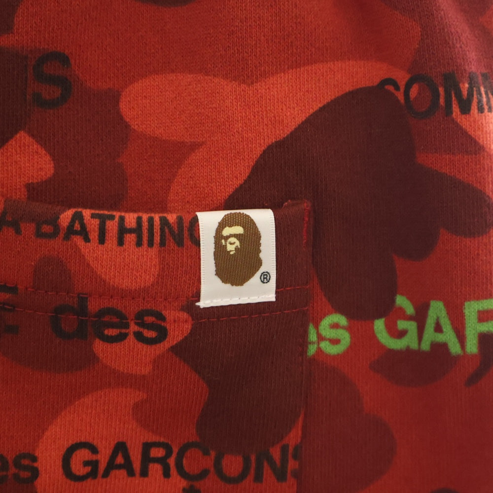 A BATHING APE(アベイシングエイプ) 22AW ×COMME des GARCONS コムデギャルソン カモ総柄 スウェットパンツ レッド 001PTI731901C