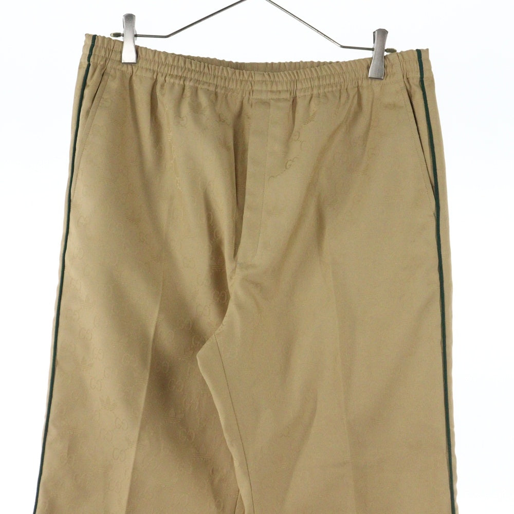 GUCCI(グッチ) 23SS ×adidas Fluid Drill Pants Beige 総柄 フルイド ドリル パンツ ベージュ 705276 ZAI22