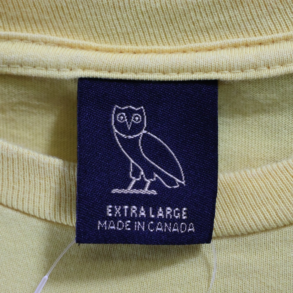 October's Very Own(オクトーバーズベリーオウン) OVO Marigold Crest T-shirt ロゴプリント クルーネックTシャツ イエロー