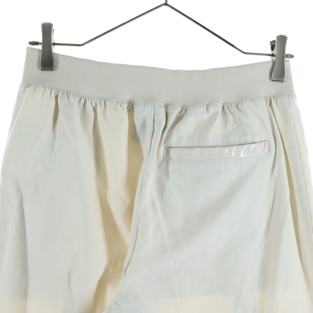 NIKE(ナイキ) アイコンクラッシュ ウインドブレーカー パンツ トレーニングパンツ CU6926-104 ベージュ レディース