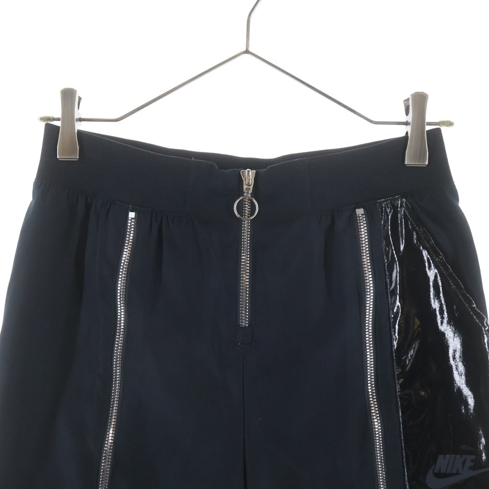 NIKE(ナイキ) フロントジップ ウインドブレーカーパンツウーブン CU6926-010 ブラック レディース