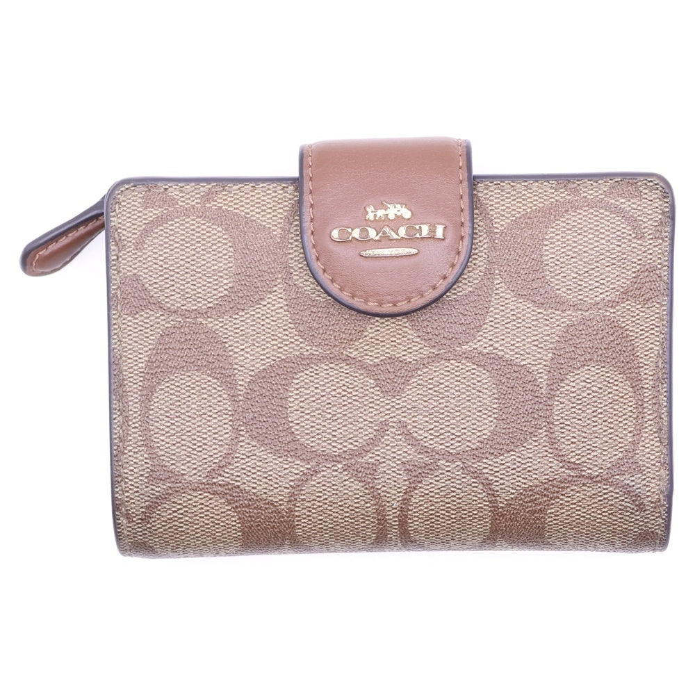 COACH(コーチ) PVC シグネチャー 二つ折り財布 ベージュ