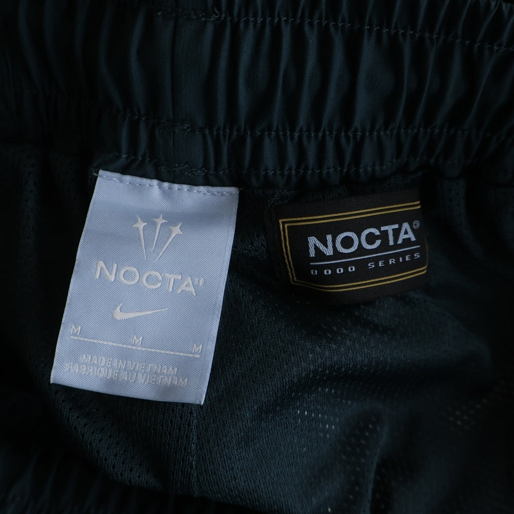 NIKE(ナイキ) 23AW ×NOCTA M NRG TB TRACK PANT ノクタ FZ3480-328 ナイロン トラックパンツ グリーン