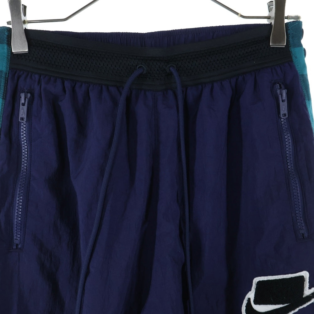 NIKE(ナイキ) サイドボタン ナイロンパンツ ネイビー/グリーン BV4547-498