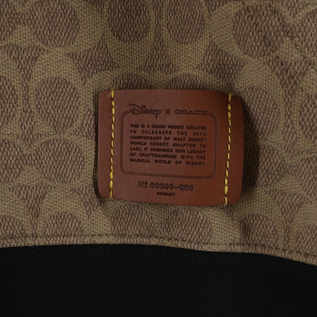 COACH(コーチ) ×DISNEY ミッキーマウス シグネチャー フーディー プルオーバーパーカー ブラウン C9479