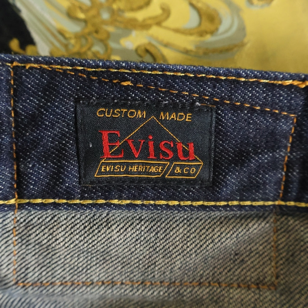 EVISU(エビス) ハンドブラシ大黒プリントと波刺繍 リラックスフィット デニムパンツ インディゴ 2EAHTM5JE106730DN